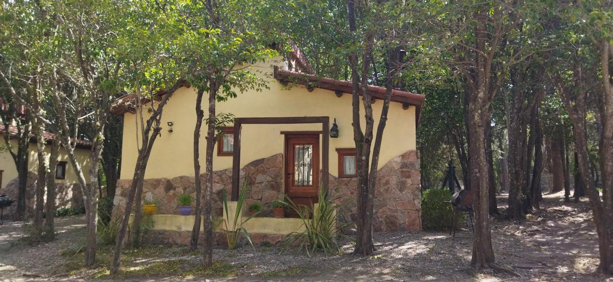 Cabañas El Mirador La Falda Exterior foto
