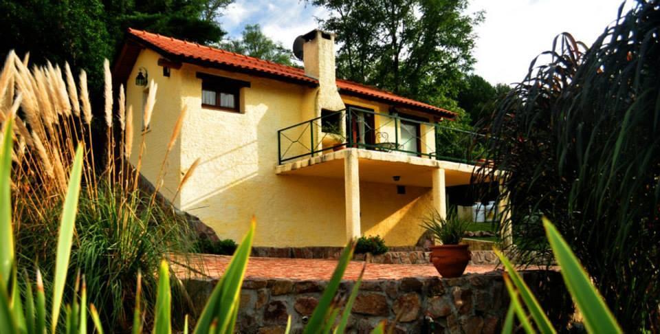 Cabañas El Mirador La Falda Exterior foto